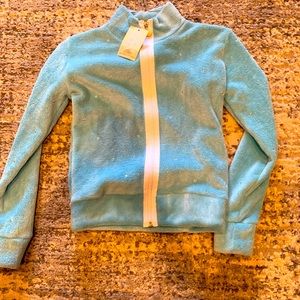 Karisma fluffy blue jacket with rhinestones.